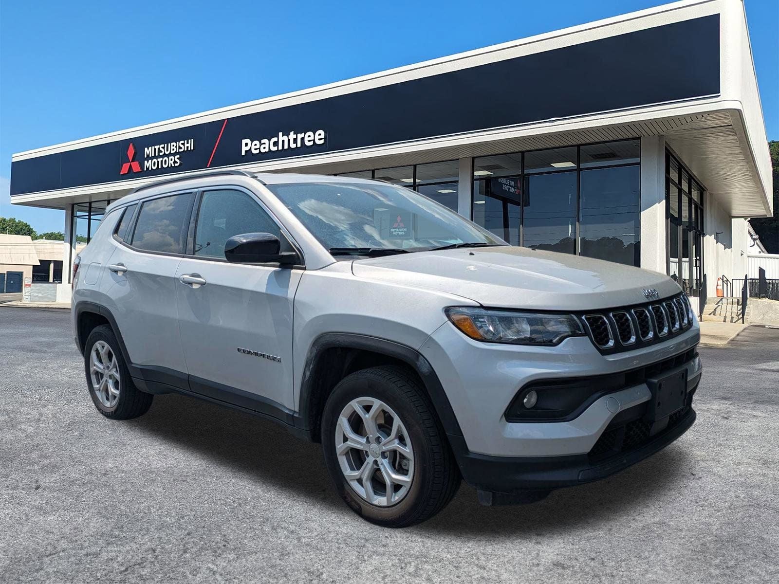 2024 Jeep Compass Latitude in Silver Zynith Metallic Clearcoat — front three-quarter view