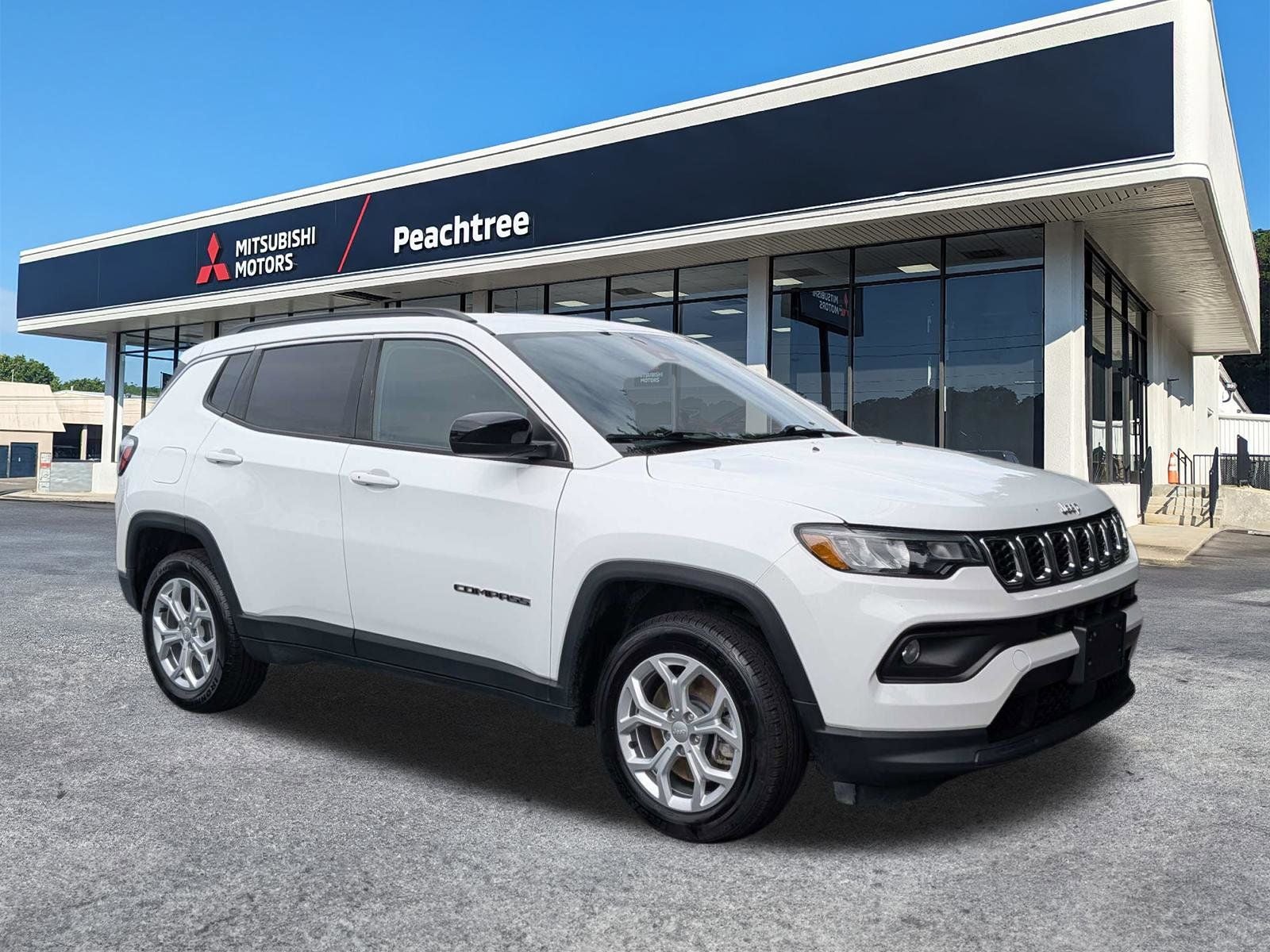 2024 Jeep Compass Latitude in Bright White Clearcoat — front three-quarter view