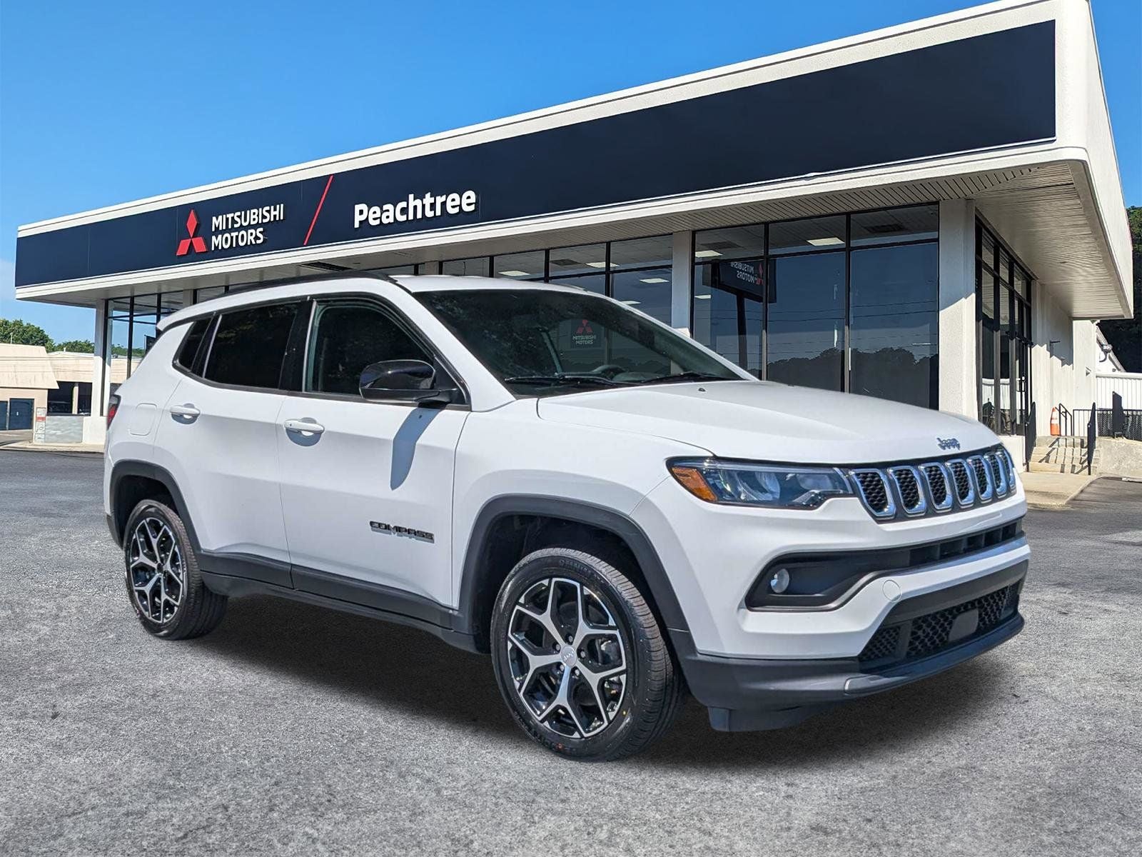 2024 Jeep Compass Latitude in Bright White Clearcoat — front three-quarter view