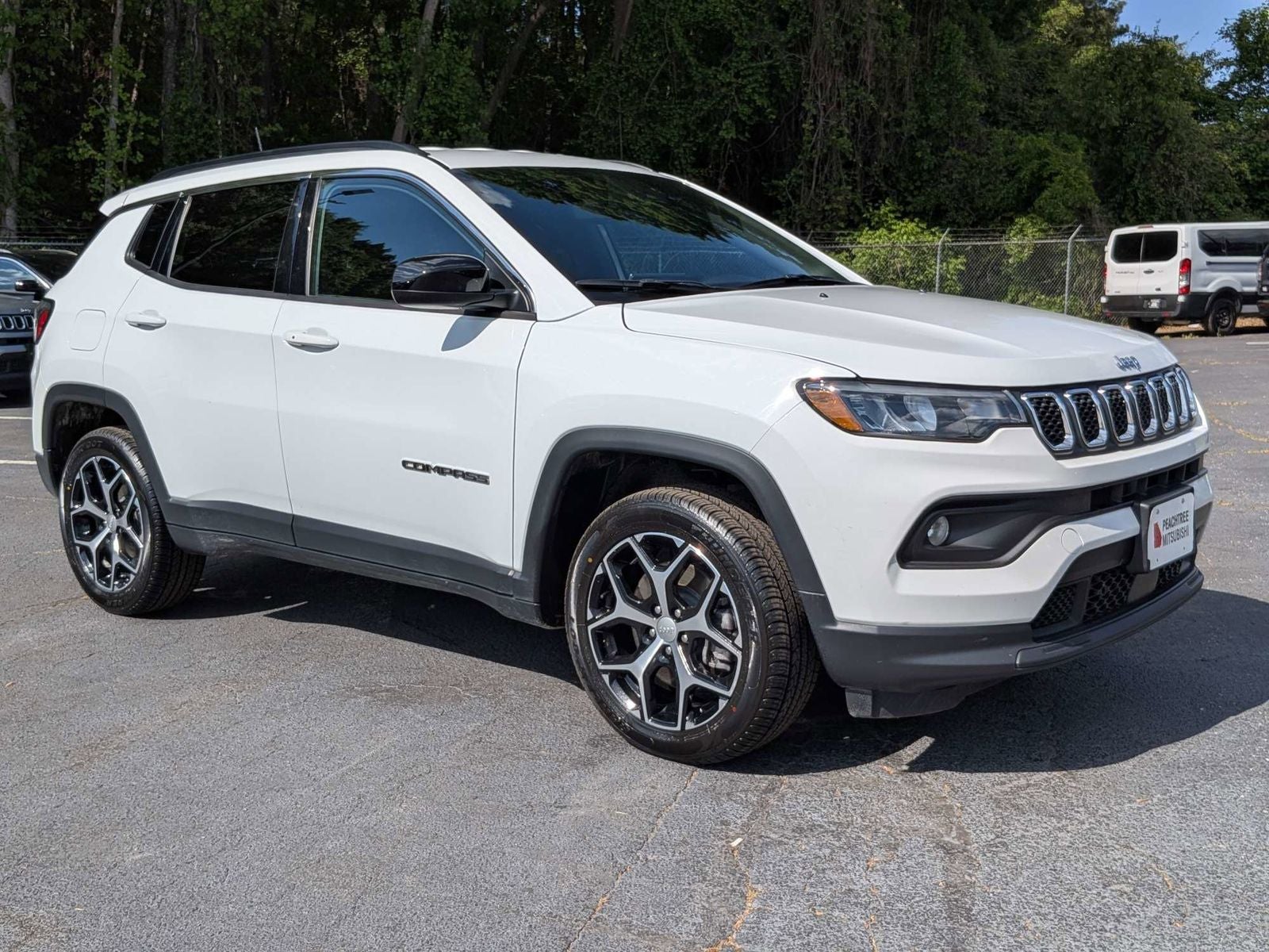 2024 Jeep Compass Latitude in Bright White Clearcoat — front three-quarter view