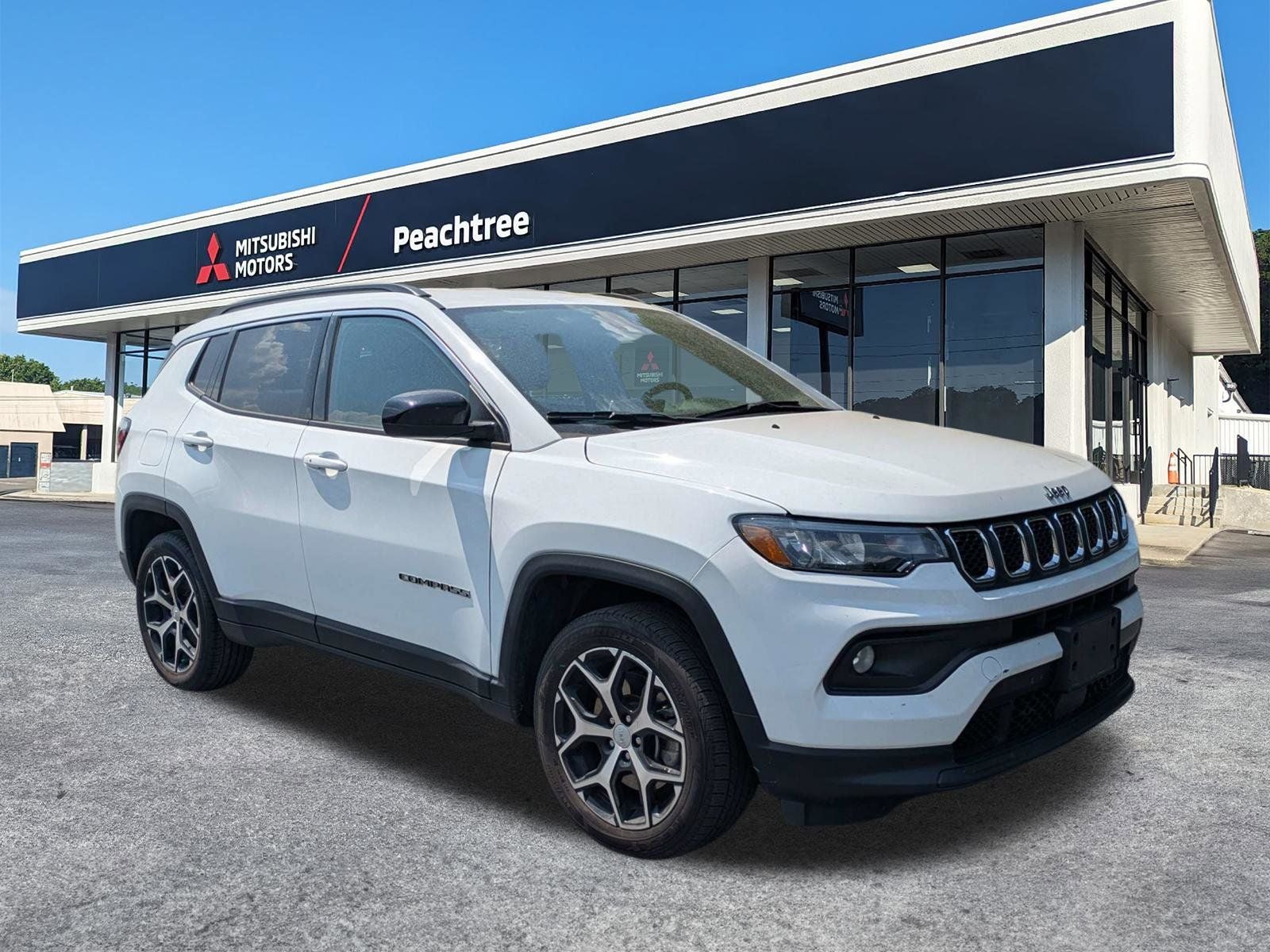 2024 Jeep Compass Latitude in Bright White Clearcoat — front three-quarter view