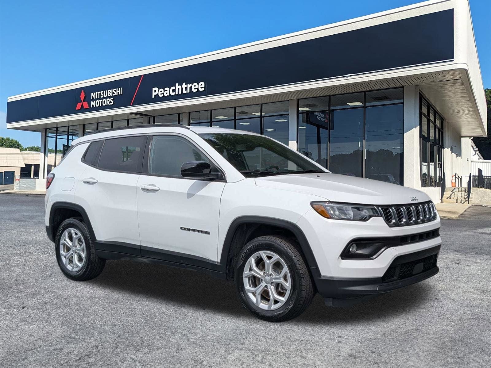 2024 Jeep Compass Latitude in Bright White Clearcoat — front three-quarter view