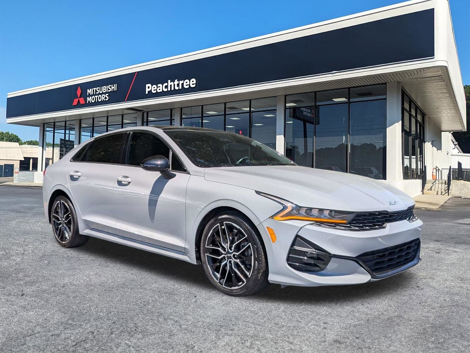 2024 Kia K5 GT in Wolf Gray — front three-quarter view