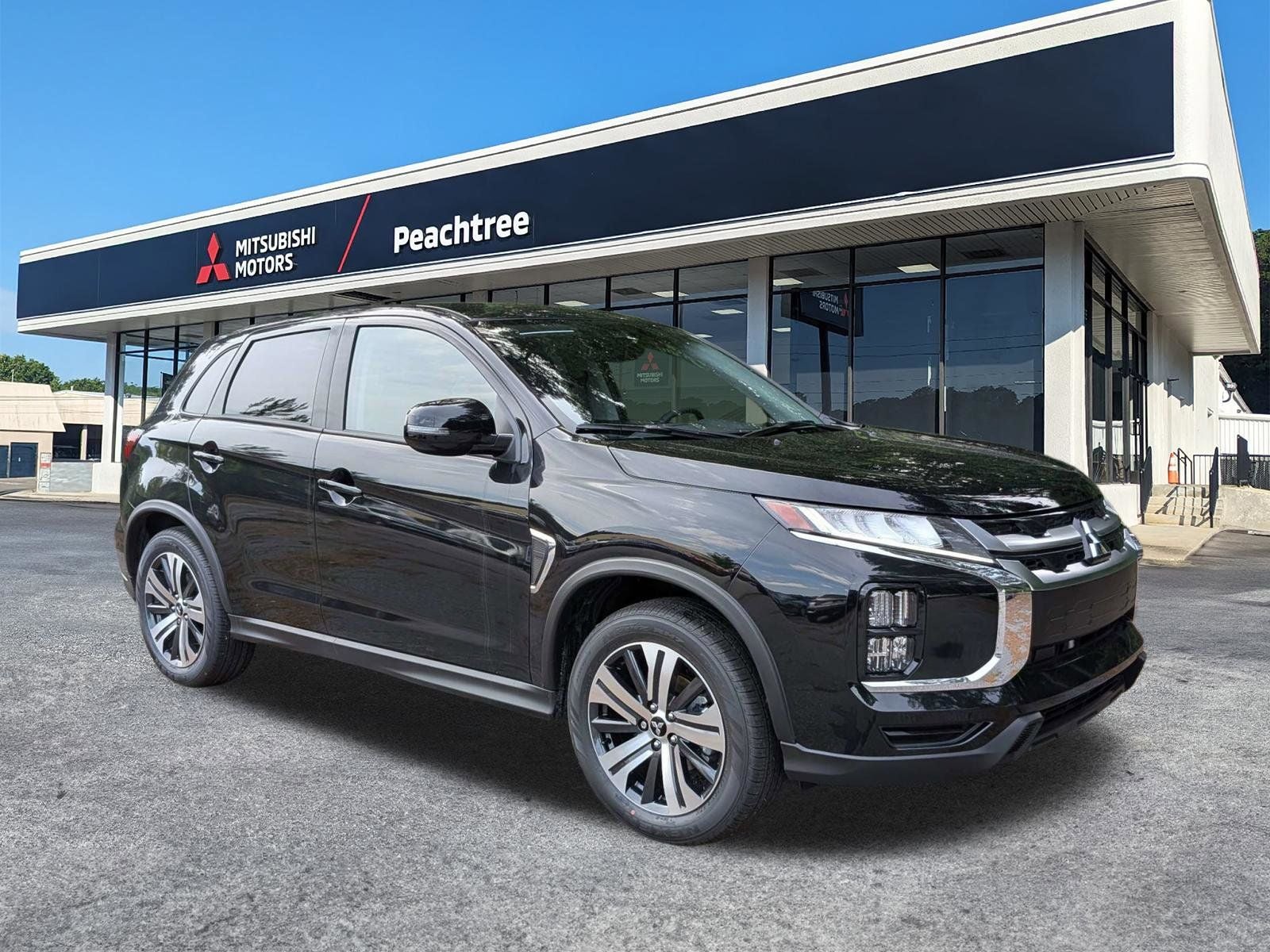 2026 Mitsubishi Outlander Sport 2.0 SE in Labrador Black Pearl — front three-quarter view