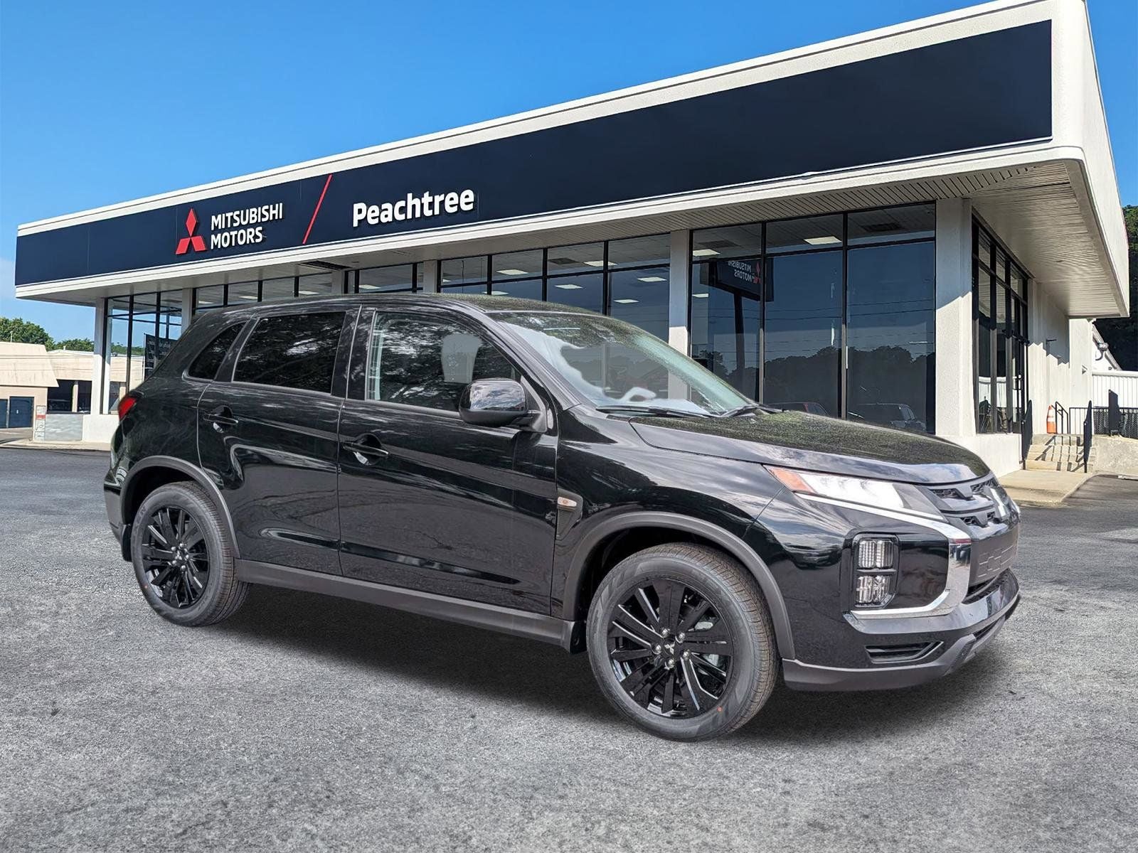 2026 Mitsubishi Outlander Sport 2.0 LE in Labrador Black Pearl — front three-quarter view
