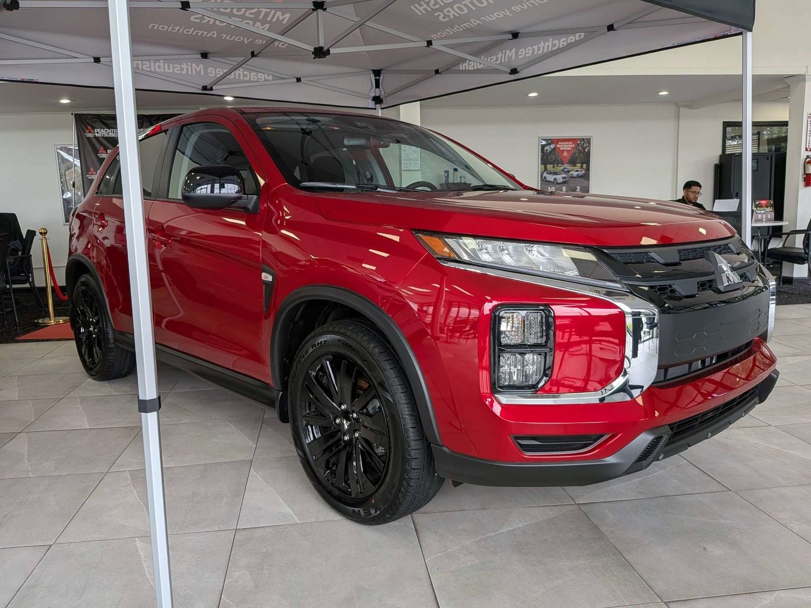 2026 Mitsubishi Outlander Sport 2.0 LE in Red Diamond — front three-quarter view