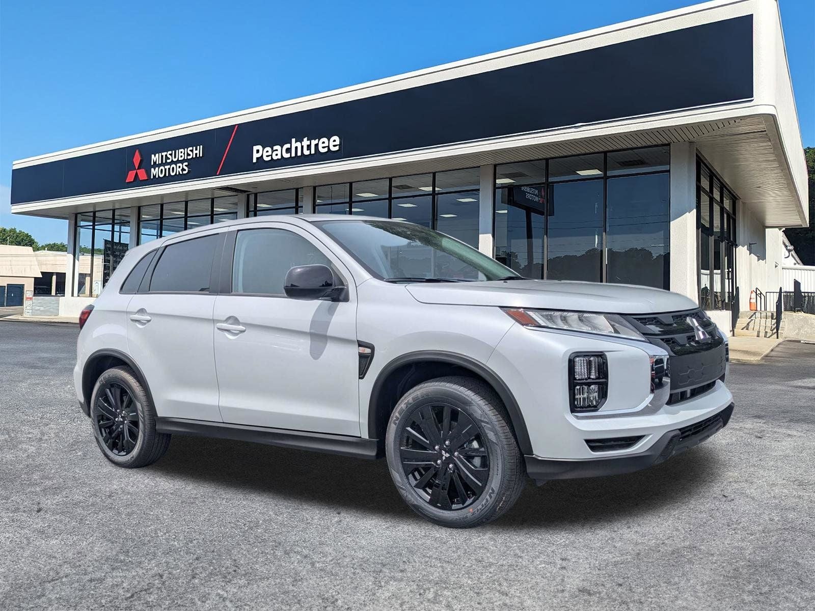 2026 Mitsubishi Outlander Sport 2.0 LE in White Diamond — front three-quarter view