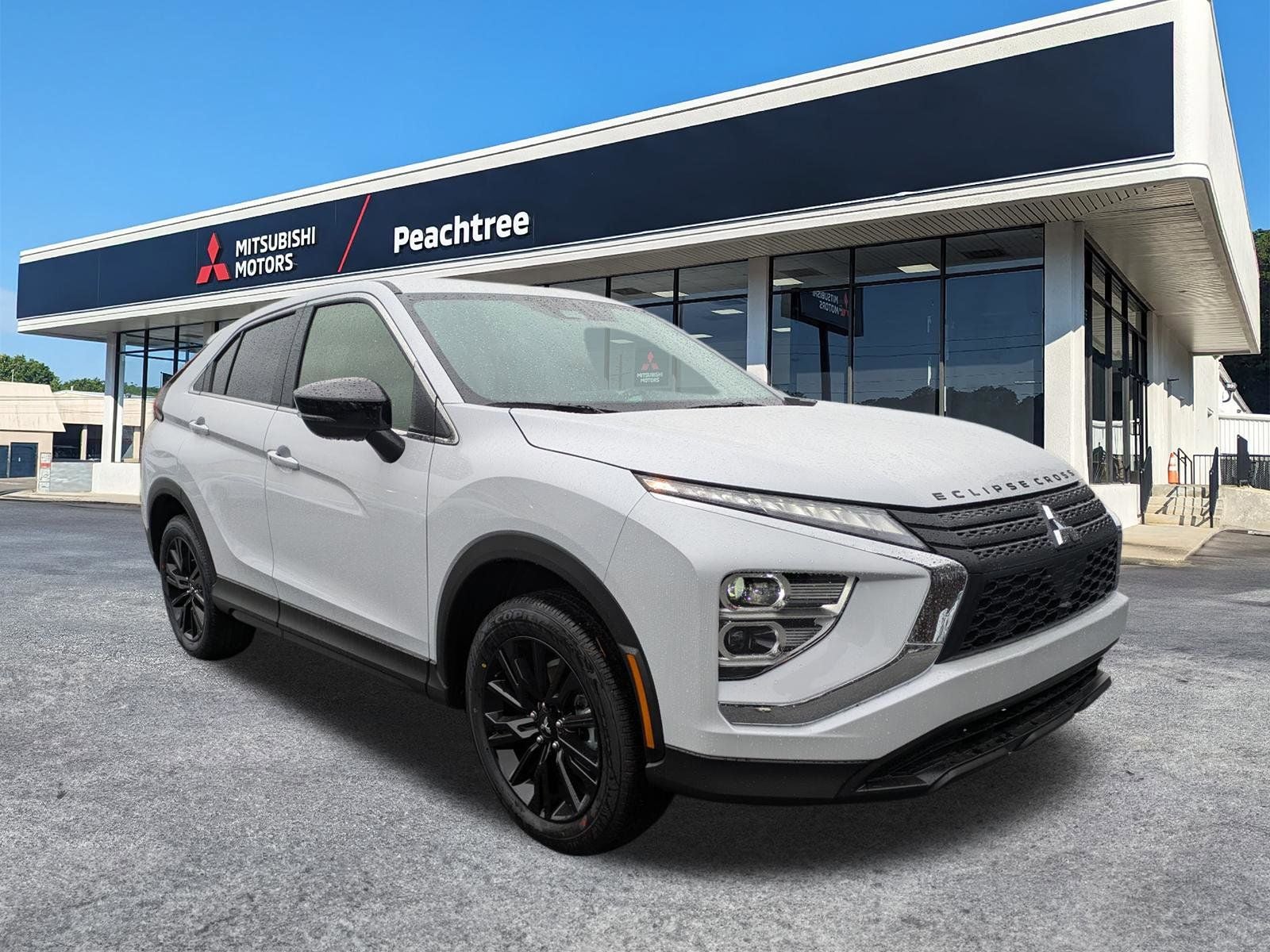 2026 Mitsubishi Eclipse Cross LE in White Diamond — front three-quarter view