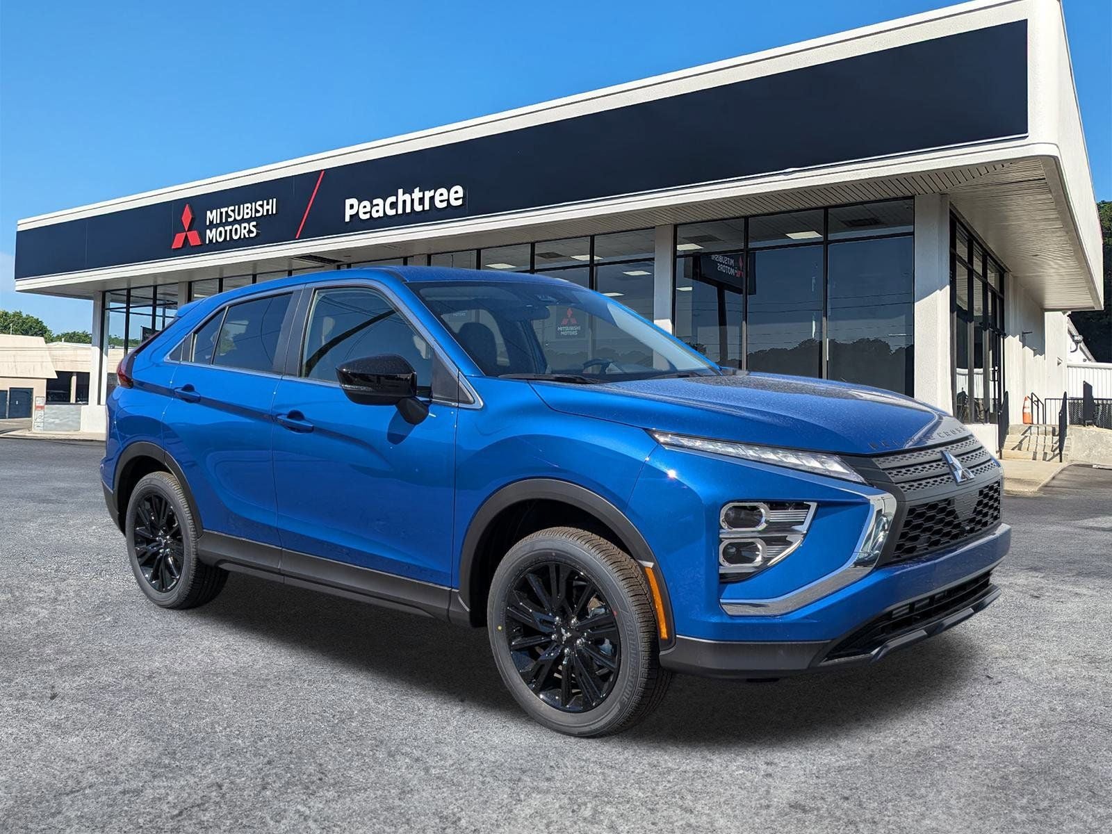 2026 Mitsubishi Eclipse Cross LE in Lightning Blue Metallic — front three-quarter view