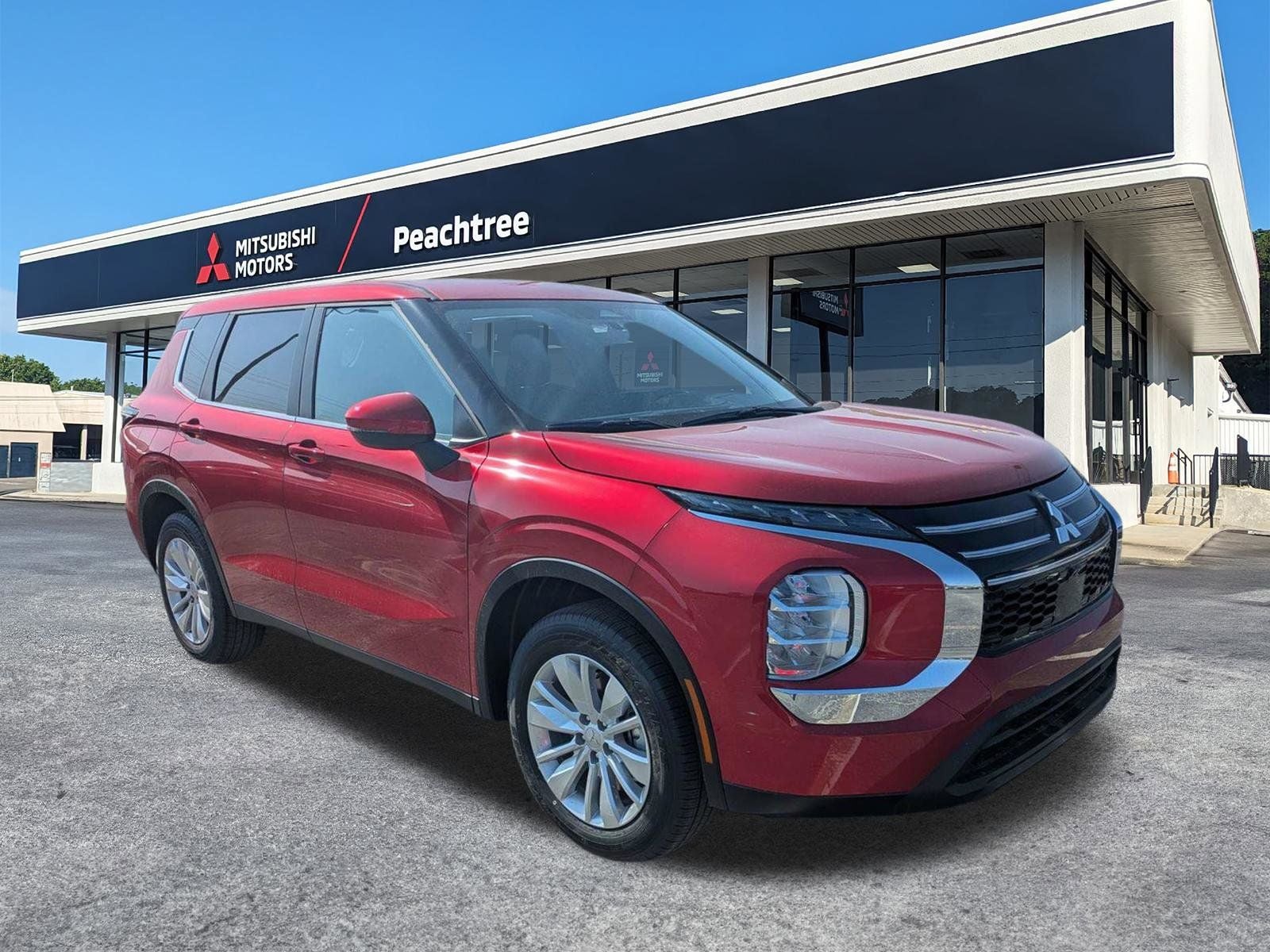 2026 Mitsubishi Outlander ES in Red Diamond — front three-quarter view