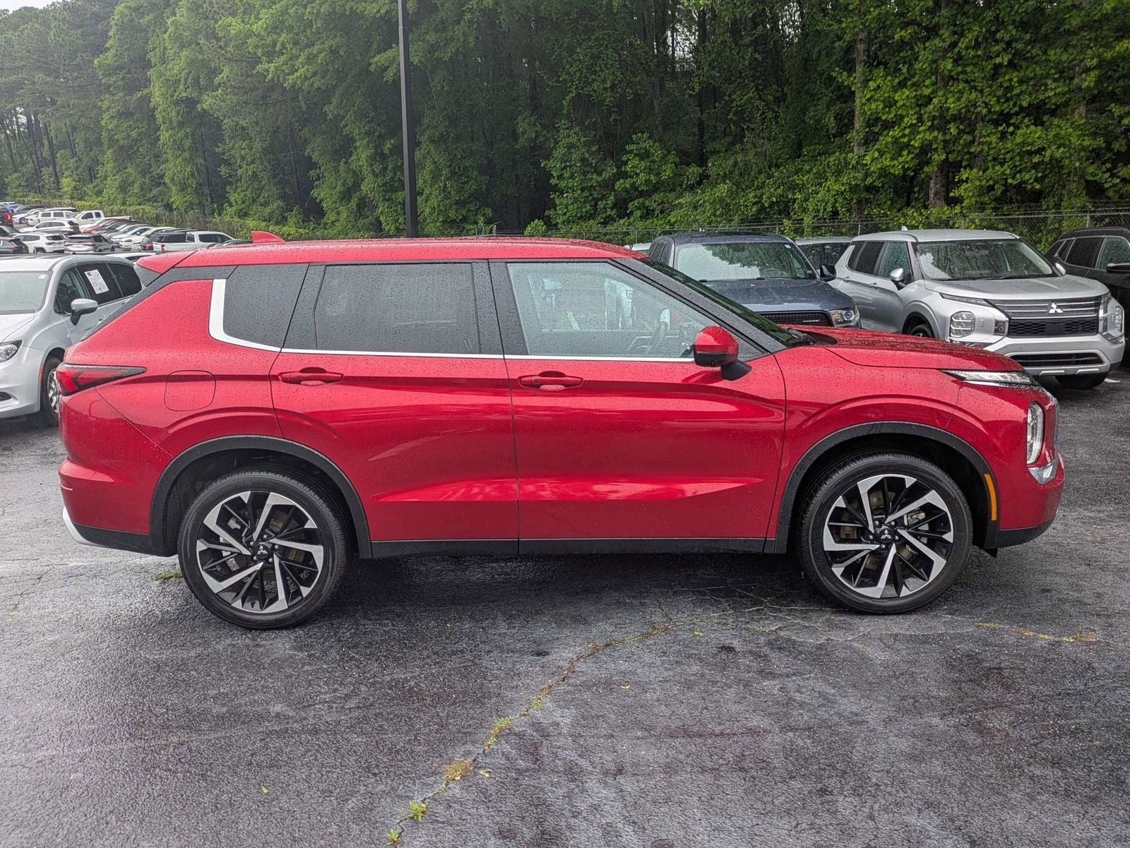 2024 Mitsubishi Outlander — rear three-quarter view
