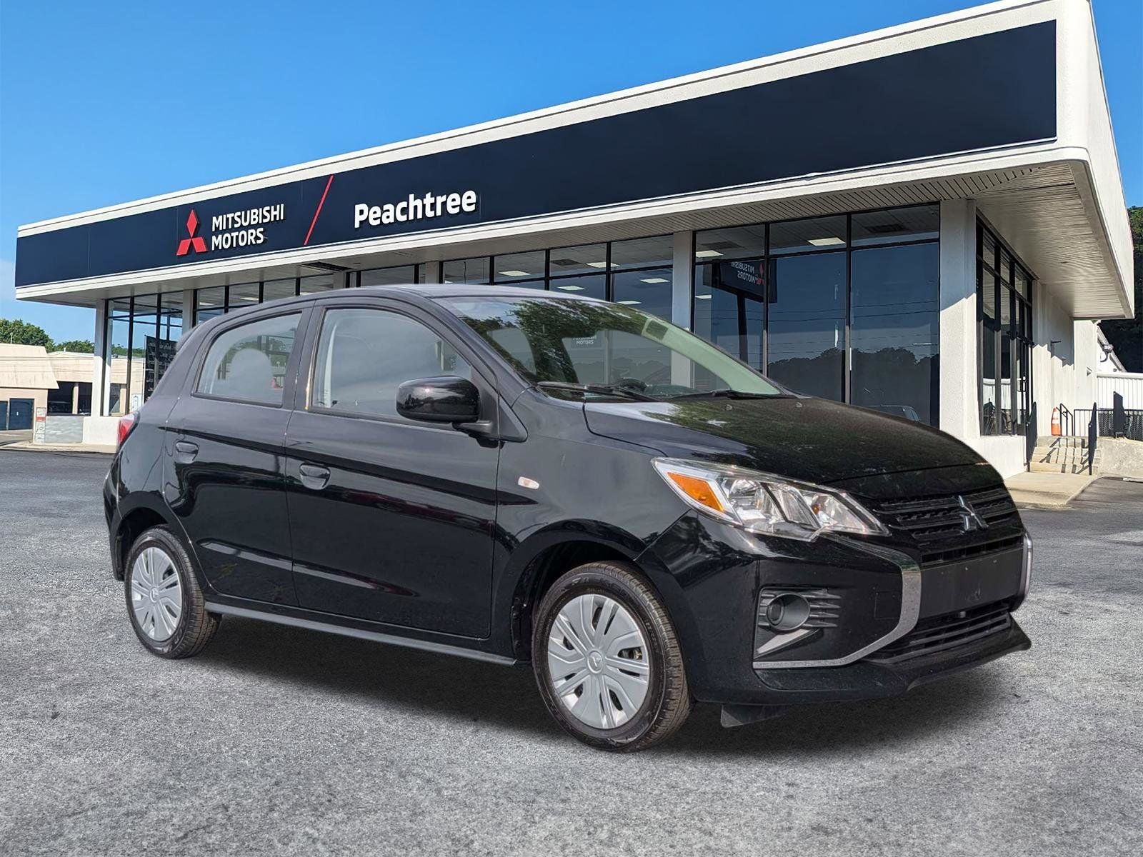 2024 Mitsubishi Mirage LE in Jet Black Metallic — front three-quarter view
