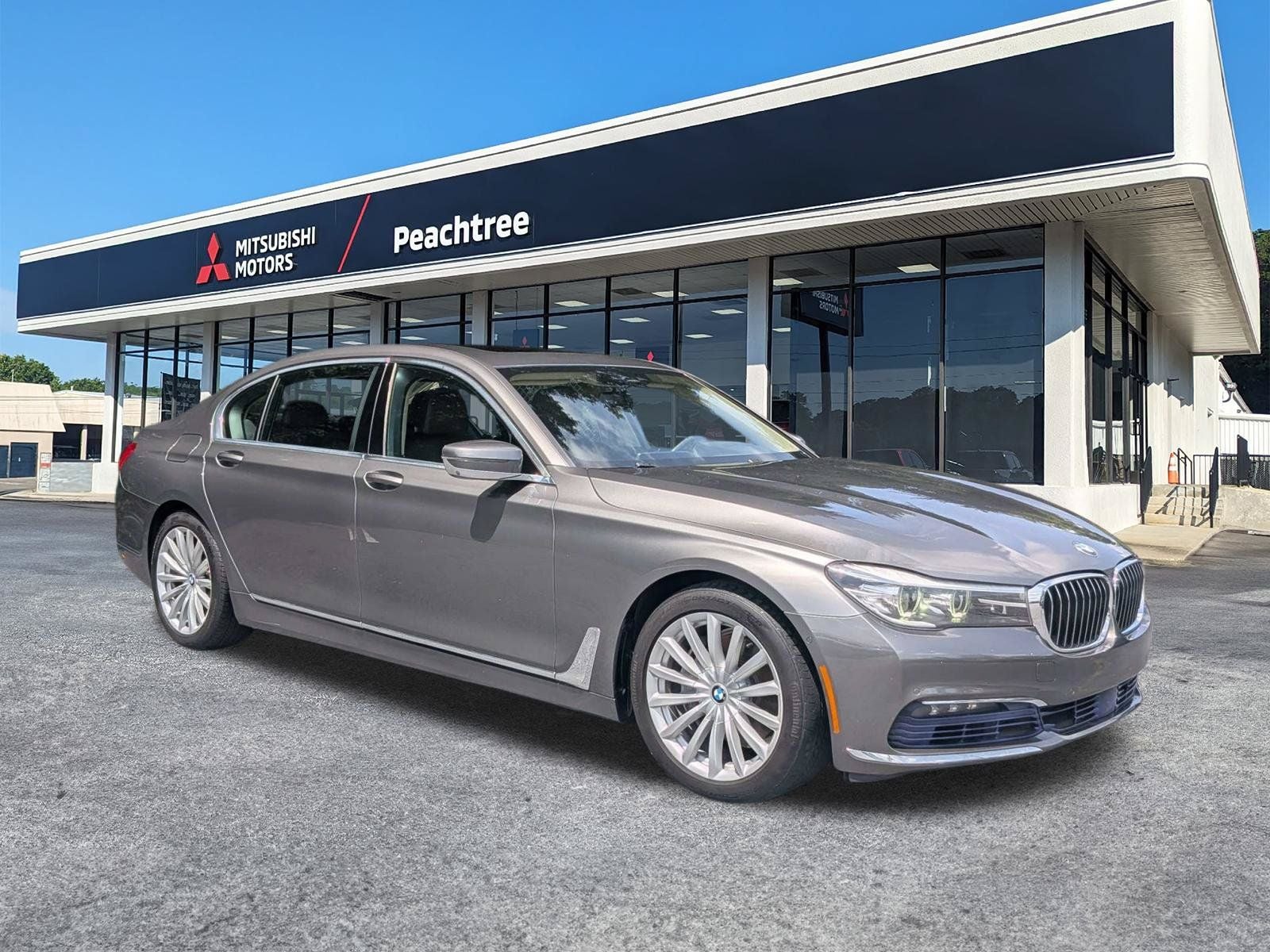 2016 BMW 7 Series 740i in Gray Metallic — front three-quarter view
